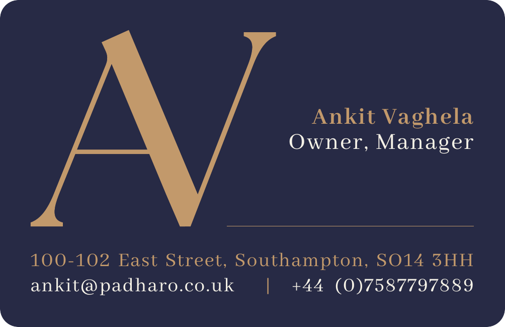 The back of Ankit Vaghela's Padharo business card, navy with a gold monogram